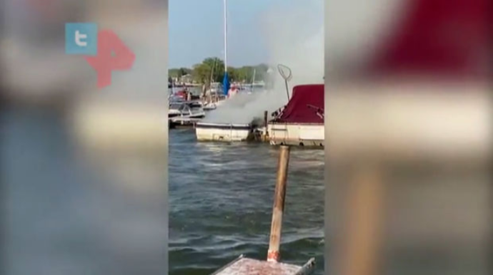 Yanan qayığı qeyri-adi üsulla söndürdü   - VİDEO