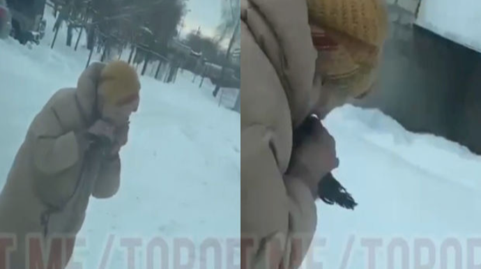 Yaşlı qadın küçənin ortasında göyərçini parçalayıb yedi  - VİDEO