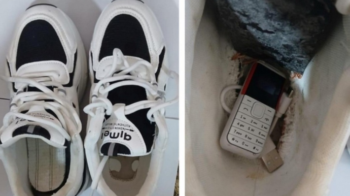 Həyat yoldaşına ayaqqabısında mobil telefon keçirmək istədi 