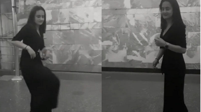 Bakı metrosunda  qəribə hərəkətlər edən qız diqqət çəkdi  - VİDEO