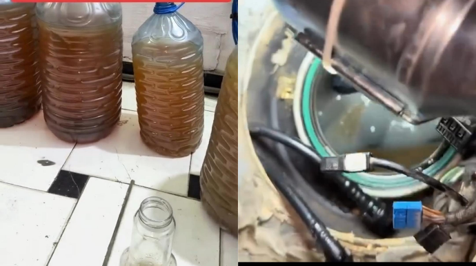 Yolun ortasında maşını sönən sürücü yanacaq çənini boşaltdı; yarısı su çıxdı - VİDEO 