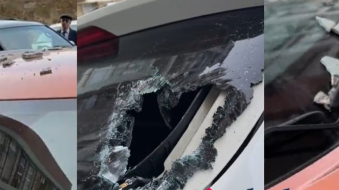 Binanın eyvanından qopan daş avtomobilə zərər vudu - VİDEO