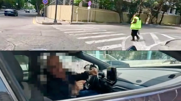 Qaydaları tərsinə anlayan sürücü motosikletçi ilə mübahisə etdi    - VİDEO