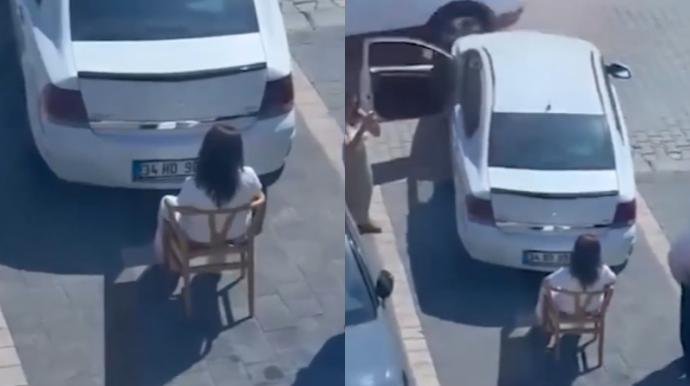 Park yeri uğrunda mübahisə: Qadın stulda oturub avtomobilə mane oldu   - VİDEO