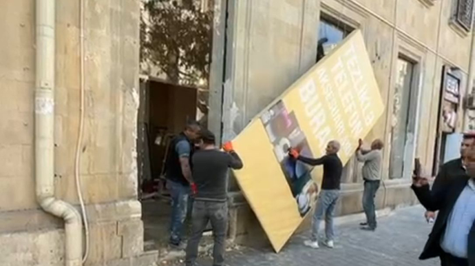 Qanunsuzluq edib reklam banerləri arxasında gizlətdilər - FOTOLAR 