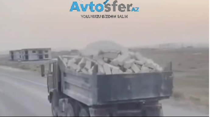 Normadan artıq daş yüklənən “KamAZ” sürücüsü təhlükə yaratdı - VİDEO 