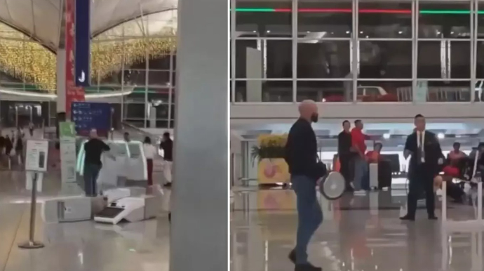 Qəzəbli turist hava limanını bir-birinə qatdı - VİDEO