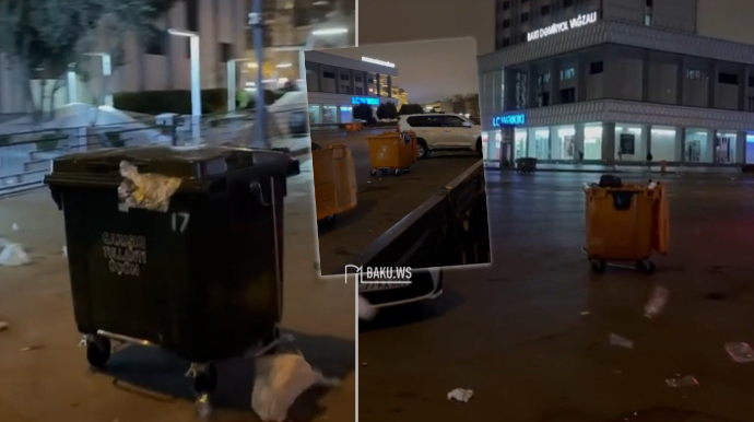 Bakıda güclü külək zibil qutularını maşınlara çırpdı - VİDEO 