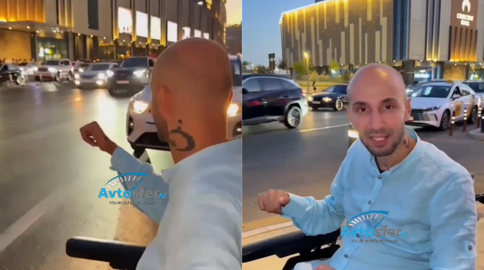 Əlil şəxs məşhur ticarət mərkəzinin önündə yolu keçməkdə çətinlik çəkdi – ŞİKAYƏT - VİDEO 