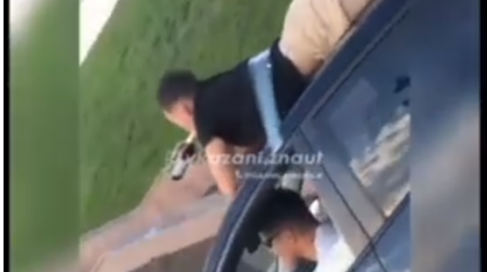 Daha bir bloger dostunu avtomobilinin damına bağlayıb yolda səyahət etdi - VİDEO