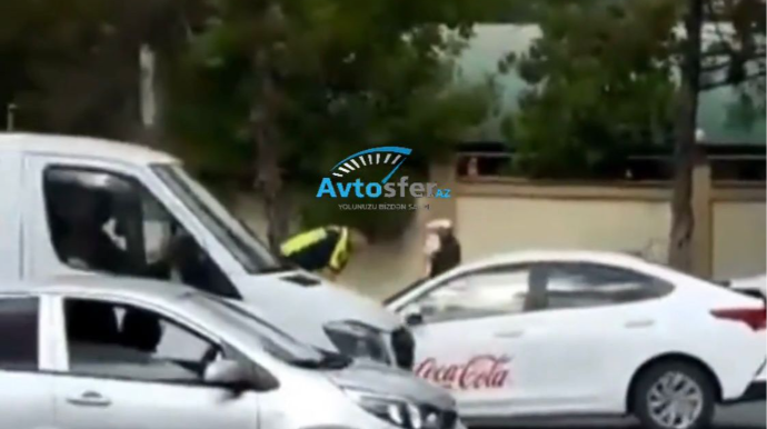 Qaçmağa çalışan sürücü yol polisini kapotda sürüdü - VİDEO