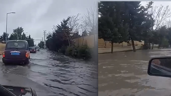 Paytaxtın daha bir keçilməz yolu  - Yağış yağanda gölməçəyə çevrilir - VİDEO 