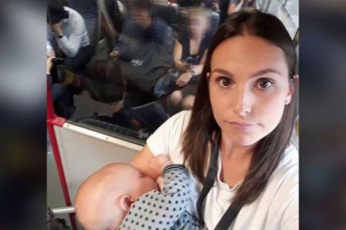 Heç kim yer vermədi, uşağını ayaqüstə əmizdirdi - FOTO