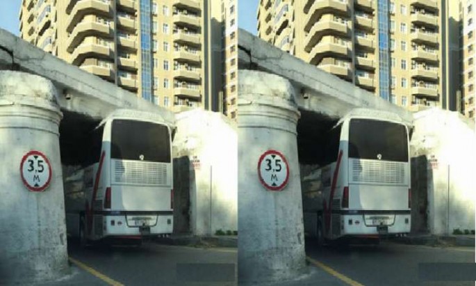 Sürücü öz avtobusundan xəbərsizdir, hündürlüyü bilmir - FOTO