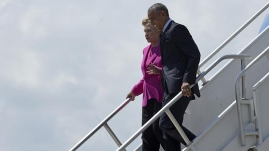 Obama uçdu, yol pulunu Klinton ödədi