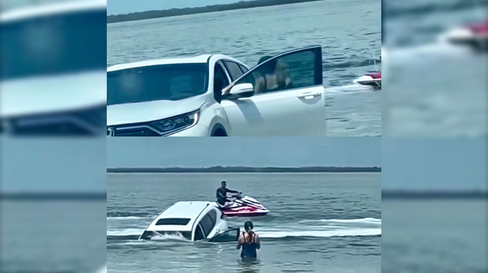 Avtomobilini dənizin sahilində park edərkən suda batırdı   - VİDEO