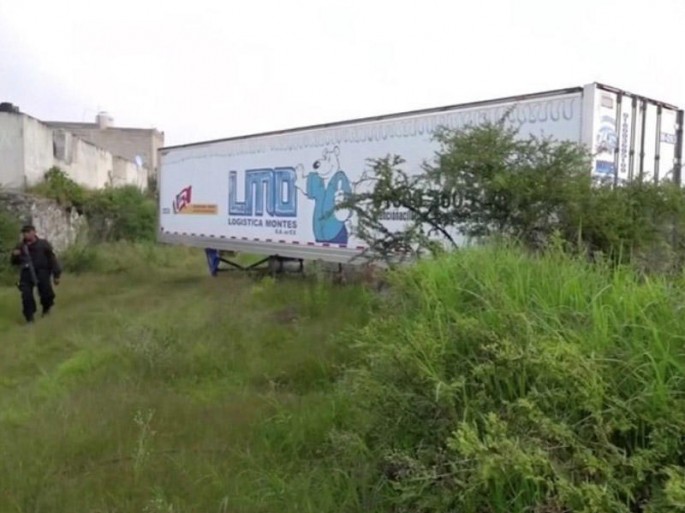 157 cəsədin olduğu yük avtomobili aşkarlanıb