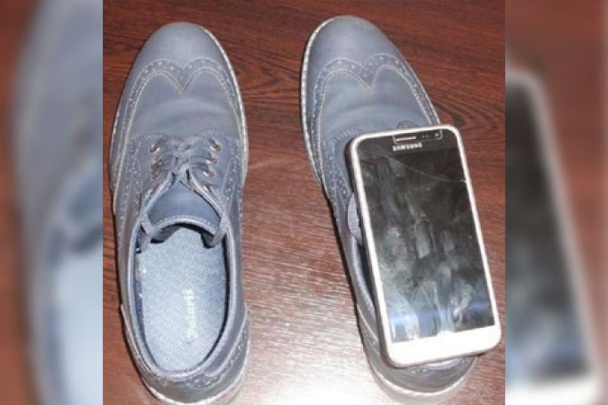 Bakıda məhkuma gətirilən ayaqqabının içərisində telefon aşkarlanıb