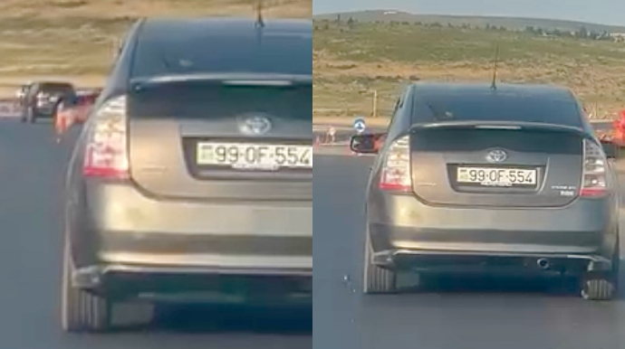 Sükan arxasında tum çırtlayıb qabıqlarını yola atdı - 99-OF-554   - VİDEO