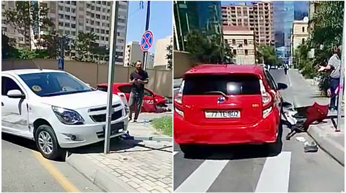 Xətaidə qəza:  “Toyota” ilə “Chevrolet” toqquşdu, yol nişanı qopdu  - VİDEO