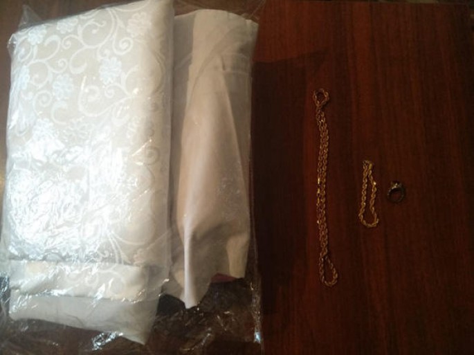 Evdən dəyəri 1300 manatdan artıq olan qızıl əşyalar oğurlanıb