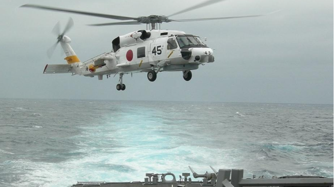 Yaponiyada itən helikopterin heyət üzvünə aid dəbilqə tapılıb