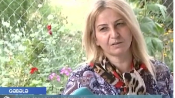 Şəhid ailələrindən çəkiliş üçün pul istəyən qadın danışdı - VİDEO