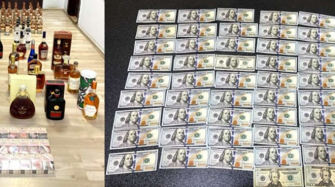 Ölkəyə qanunsuz spirtli içkilər, siqaret və xarici valyuta keçirmək istədi 