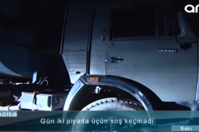 “KamAZ”-ın vurduğu piyadanı taksi xəstəxanaya apardı – VİDEO