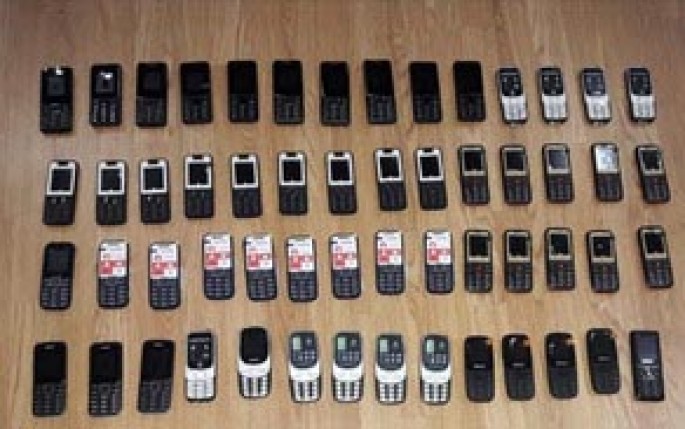 Avtomobildən qanunsuz 70 ədəd mobil telefon aşkarlanıb