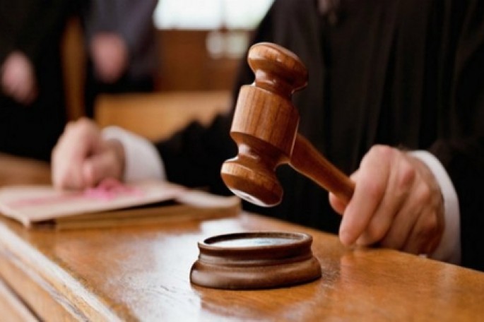 Müştəriyə görə adam bıçaqlayan taksi sürücüsü məhkəmədə həbs edildi