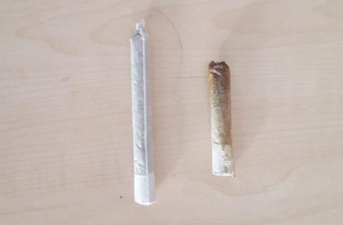 Siqaretin içində marixuana keçirmək istəyən şəxs yaxalandı