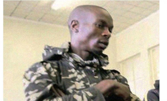 Əlində insan ayağı olan kannibal polisə təslim oldu - FOTO