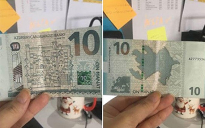 Təzə 10 manatı mağazada saxta pul bildilər