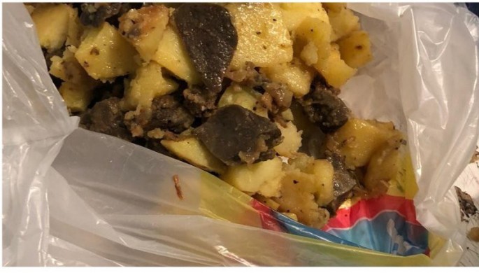 Həbsdə olan oğluna narkotik keçirmək istəyən qadın saxlanıldı