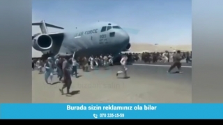 Kabildən qaçan əfqanlar təyyarədən yerə töküldü  - VİDEO