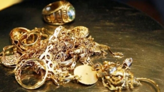 Qonşusunun qızıllarını oğurlayan qadın saxlanıldı 