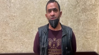 Bakıda üzərində “Kalaşnikov” gəzdirən şəxs həbs edilib - VİDEO 