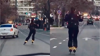 Rolik sürən qız velosiped zolağını qoyub  avtomobillərin hərəkətinə mane oldu   - VİDEO