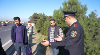 Polis təhlükəli yerlərdə qayda pozan sürücü və piyadaları yaxaladı - XƏBƏRDARLIQ - VİDEO  