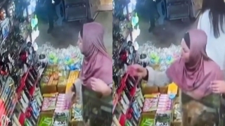 Qadının piştaxtadan oğurluq anı kameraya düşdü - VİDEO 