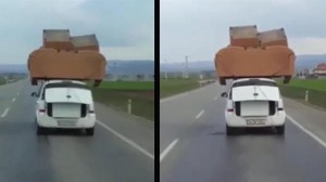 Avtomobilin üstündə divan-kreslo daşıyan sürücü - VİDEO