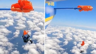 Paraşütü təyyarənin quyruğuna ilişdi, belə xilas oldu - VİDEO