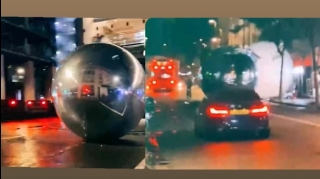 London küçələrində peyda olan nəhəng toplar insanları qorxudub  - VİDEO