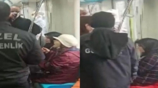 Maska taxmaqdan imtina edən qadınları qatardan zorla düşürdülər - VİDEO 