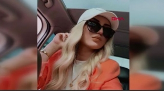 Sevgilisi ilə mübahisə edən qız eyvandan lüks avtomobilin üzərinə düşdü   - VİDEO