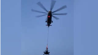 Təcili eniş edən helikopter 3 gün sonra belə daşındı - VİDEO 