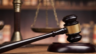 Prokuror dövlətə xəyanətdə təqsirləndirilən şəxsə 18 il cəza istəyib