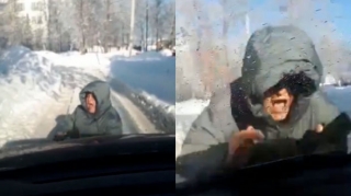 “Oskar”lıq performans:  Özünü hərəkət etməyən avtomobilin altına atdı - VİDEO 