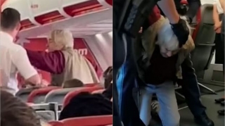 Yaşlı britaniyalı qadın ona içki verməyən stüarda yumruq atdı  - VİDEO